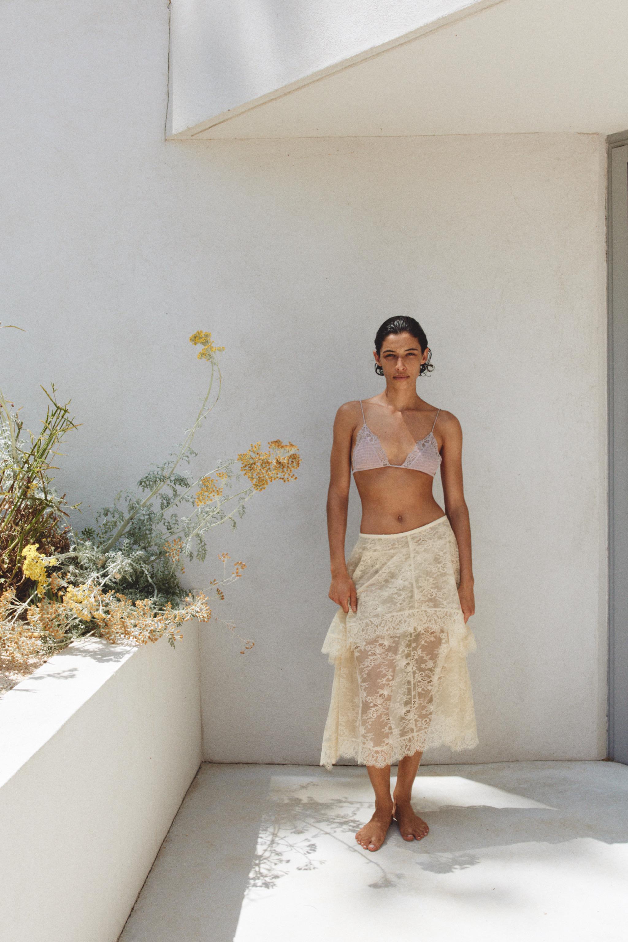 ASYMMETRIC LACE MIDI SKIRT
